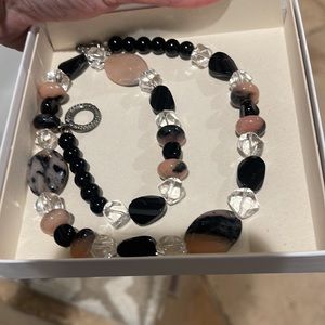 Beautiful glass and stone clear black and pink necklace.